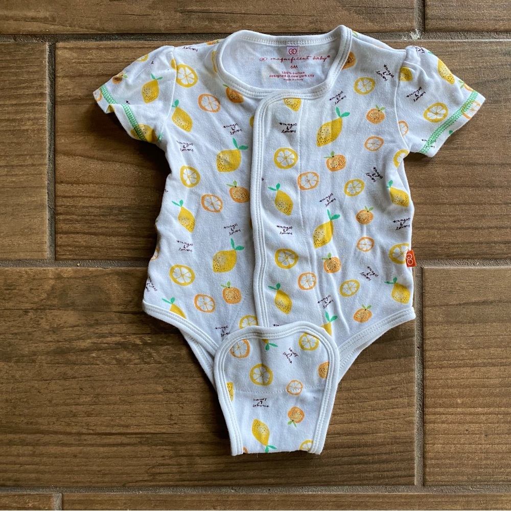 Magnificent Baby magnetic snap onesie
